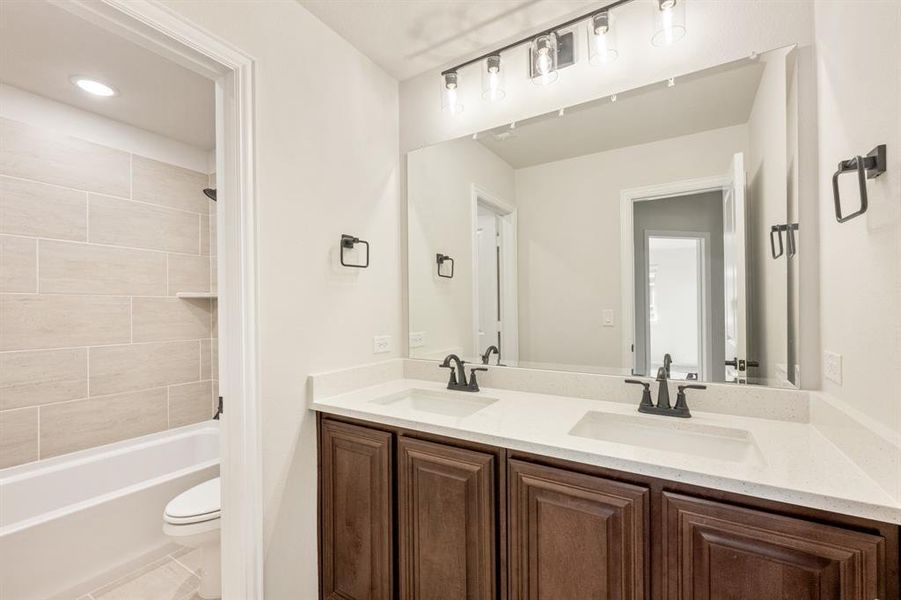 Furnished interior view inside a new home in Woodstone, Providence Village (Image 17).