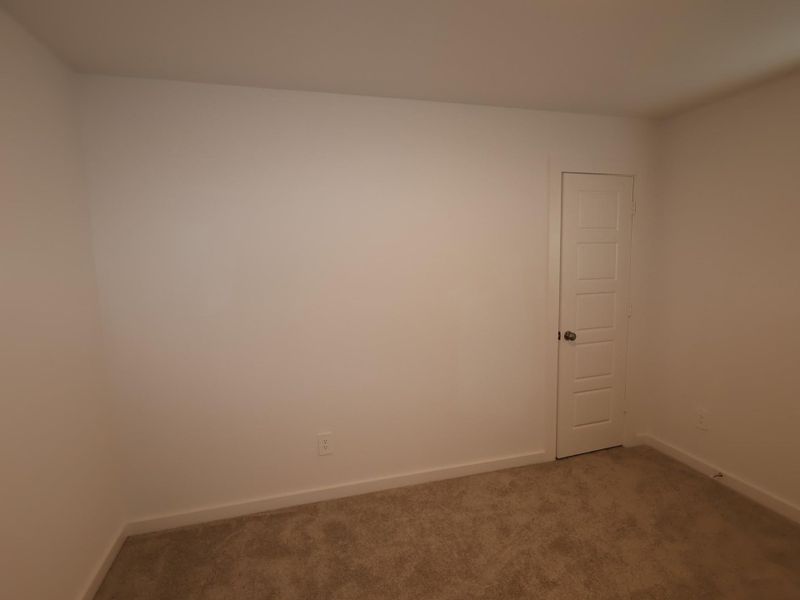 Spacious, unfurnished interior of a new home in Pinewood at Grand Texas, New Caney (Image 25).