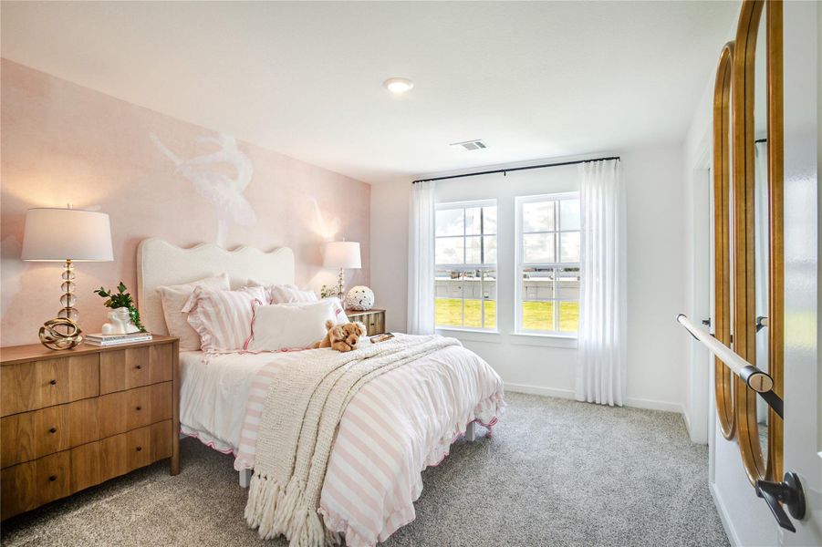 This cozy bedroom features soft pink accents and plush carpeting. A large window lets in plenty of natural light, highlighting the elegant furnishings and decorative touches. Perfect for a serene retreat. This cozy bedroom features soft pink accents and plush carpeting. A large window lets in plenty of natural light, highlighting the elegant furnishings and decorative touches. Perfect for a serene retreat.