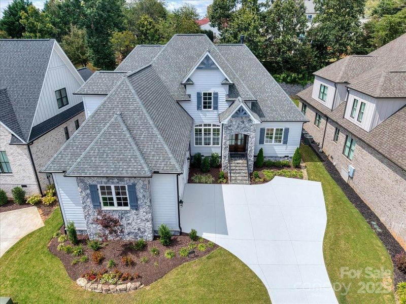 Front exterior of a new home in , Simpsonville, SC, highlighting curb appeal (Image 21).