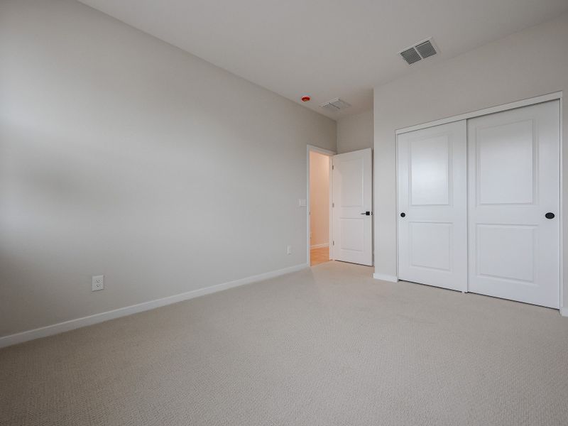 A room with white doors.