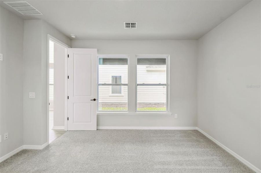Spacious, unfurnished interior of a new home in Weslyn Park in Sunbridge 34', St. Cloud (Image 39).
