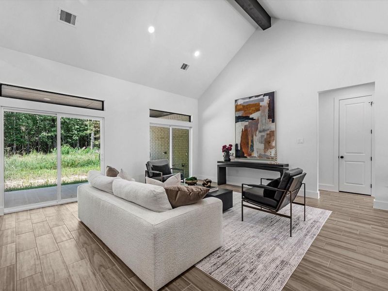 Enjoy the tall ceilings, exposed beams and the contrast of all the colors meshing beautifully.