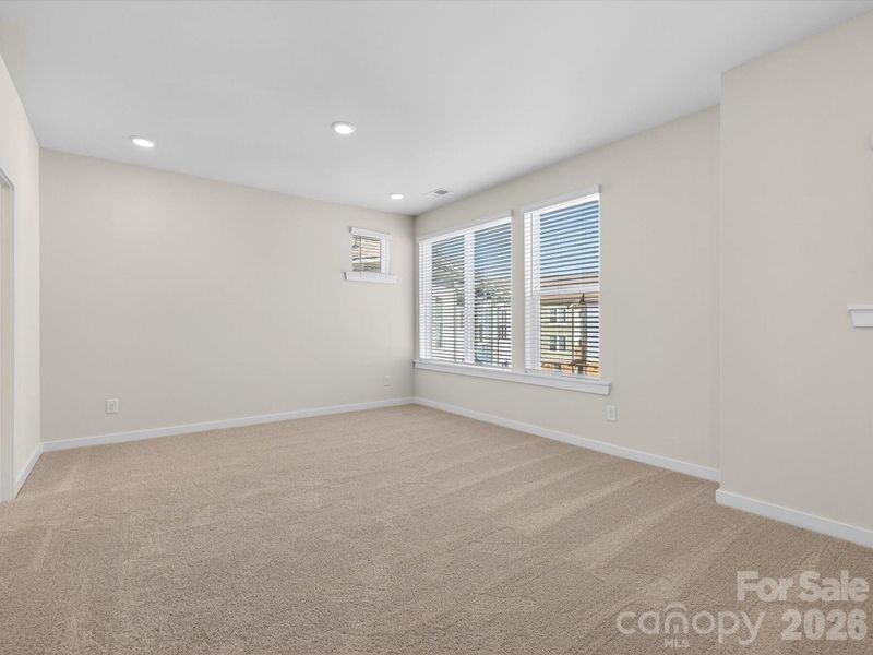 Spacious, unfurnished interior of a new home in Central Living at Craig, Charlotte (Image 14).