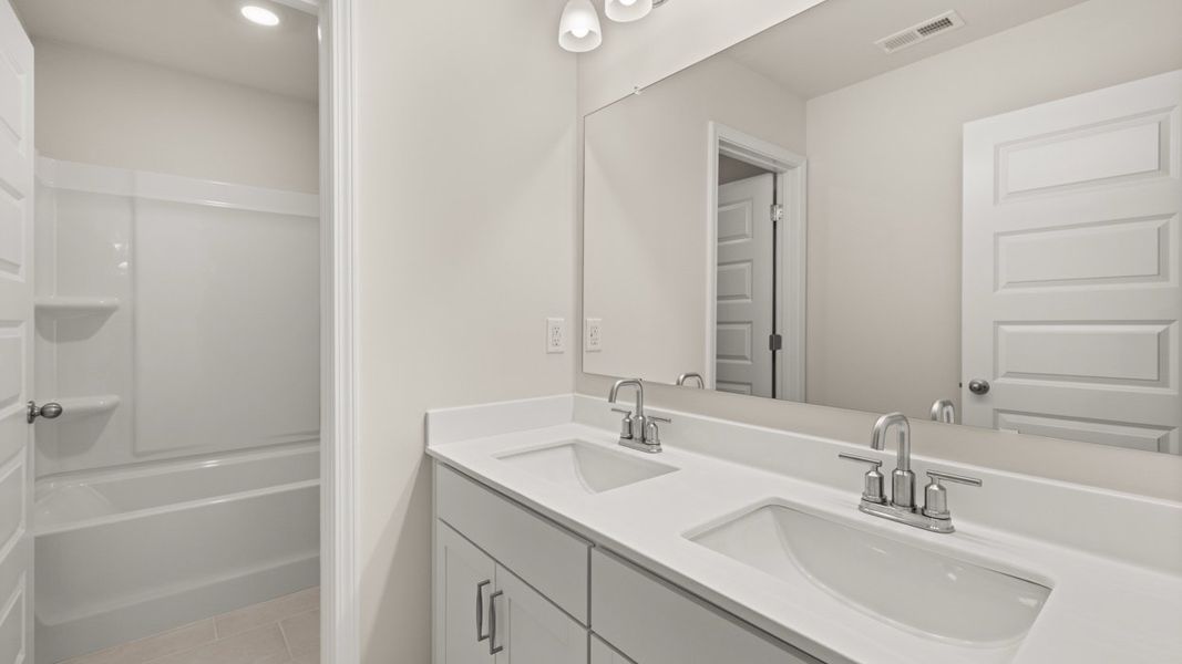 Representative furnished interior of a home built from the Summit by D.R. Horton in The Gates at Pates Creek, Hampton (Image 14).