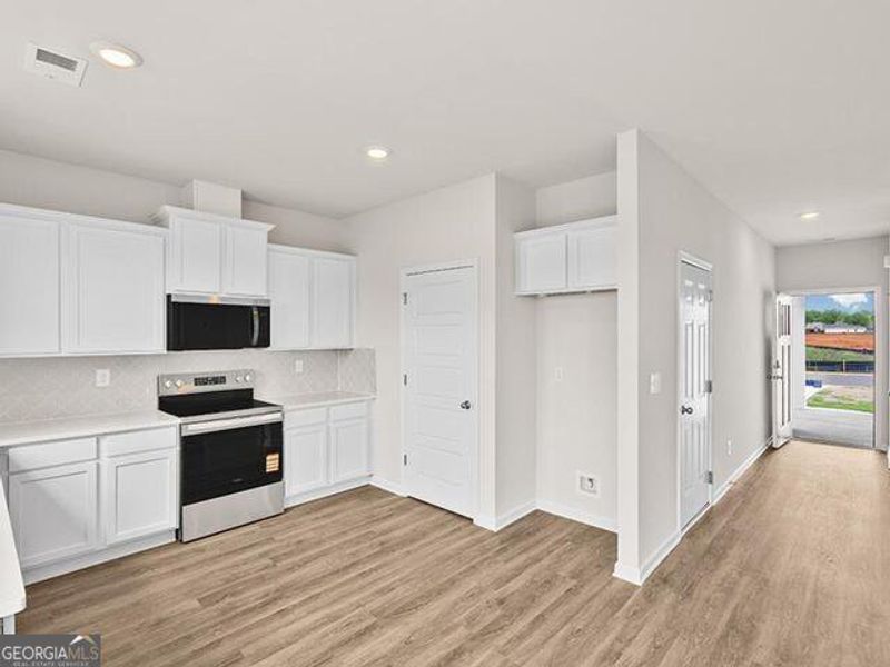 Furnished interior view inside a new home in Remington Chase, Perry (Image 6).
