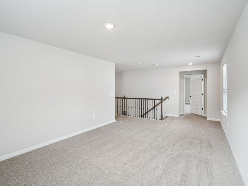 The Taylorsville floorplan with the Divine White interior package.