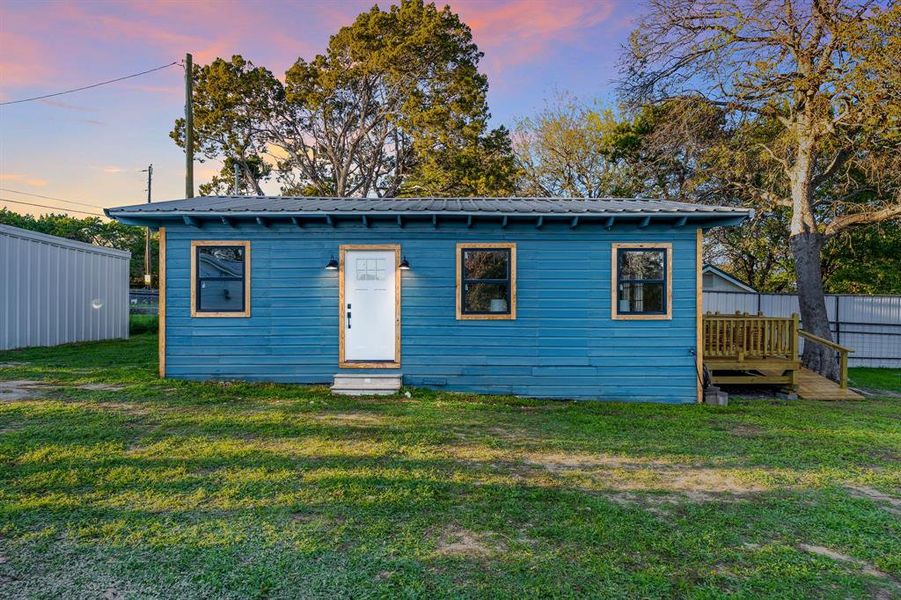 Taken down to the studs in 2023 and totally reconfigured and improved...with a metal roof and big ole back deck. Just to keep up with "The Main House."