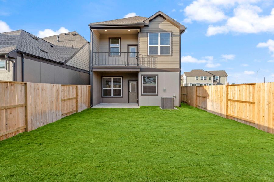 Exterior details and patio area of a home in Meridiana, Manvel (Image 3).