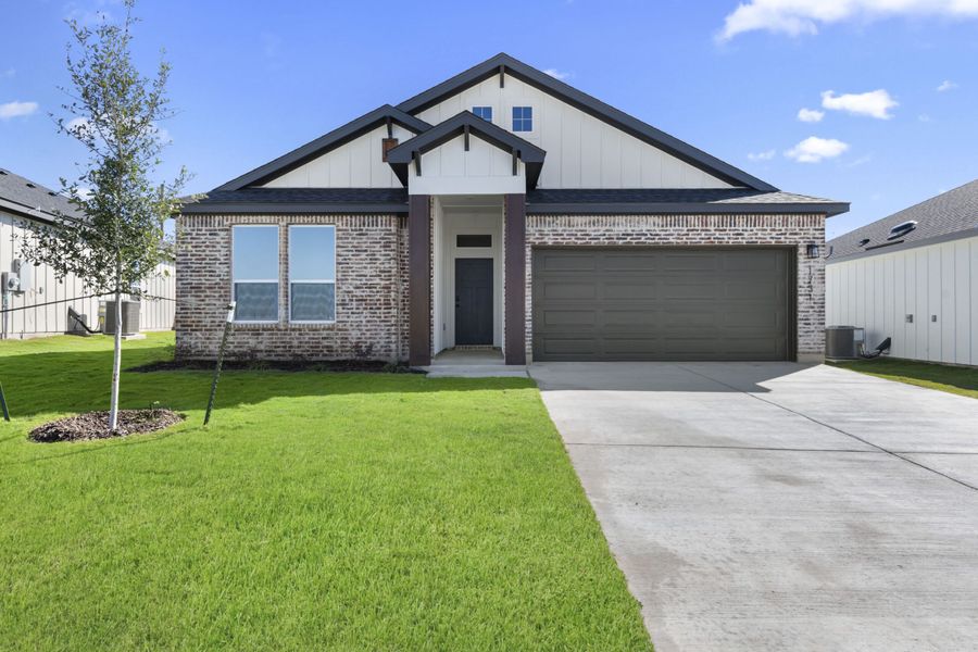Front exterior of a new home in Ridge at Knob Creek Single Family, Temple, TX, highlighting curb appeal (Image 1). Front exterior of a new home in Ridge at Knob Creek Single Family, Temple, TX, highlighting curb appeal (Image 1).