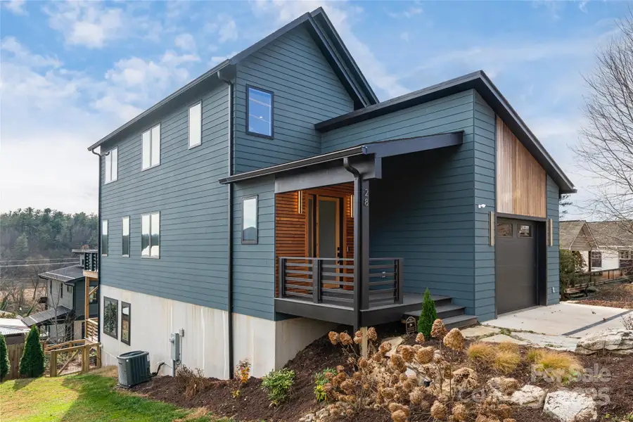 Exterior details and patio area of a home in , Asheville (Image 3). Exterior details and patio area of a home in , Asheville (Image 3).