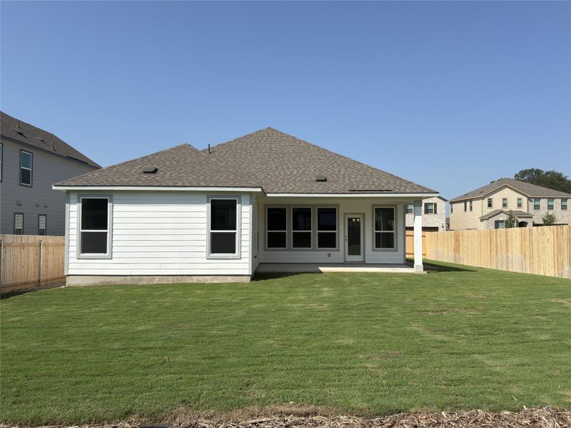 Front exterior of a new home in River Bluff, Leander, TX, highlighting curb appeal (Image 2). Front exterior of a new home in River Bluff, Leander, TX, highlighting curb appeal (Image 2).
