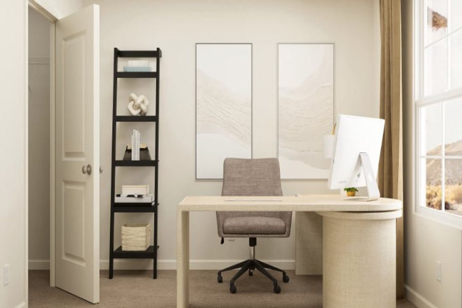 A desk with a chair and a shelf with pictures on it.