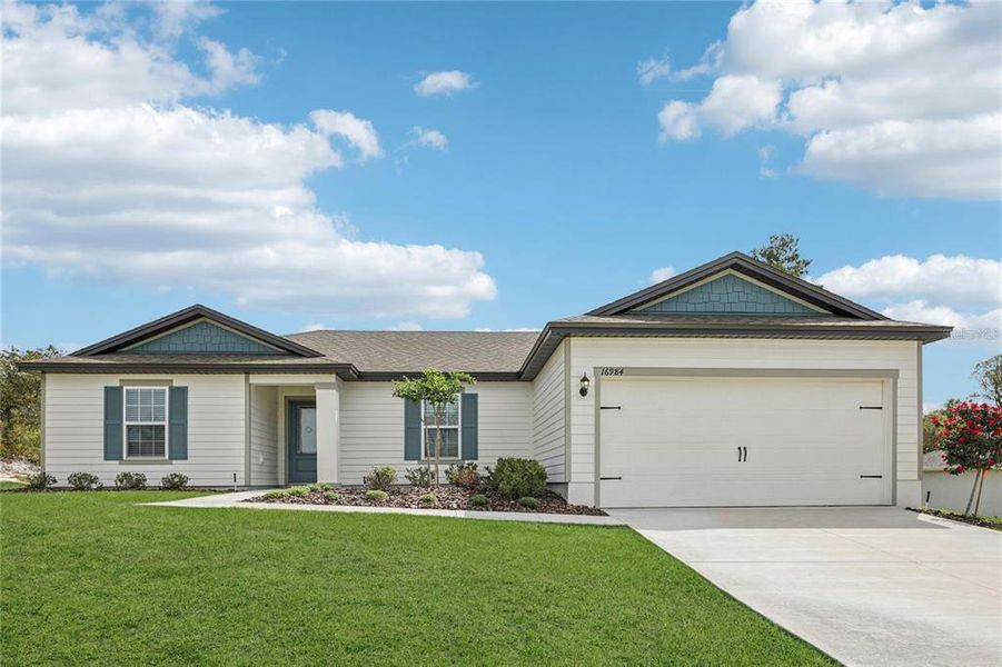 Front exterior of a new home in , Ocala, FL, highlighting curb appeal (Image 1). Front exterior of a new home in , Ocala, FL, highlighting curb appeal (Image 1).