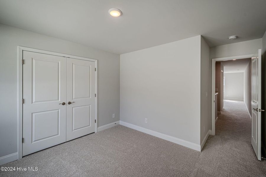 Spacious, unfurnished interior of a new home in Wood Creek, Leland (Image 25). Spacious, unfurnished interior of a new home in Wood Creek, Leland (Image 25).