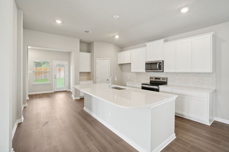 Kitchen in a Rio Grande floorplan at a Meritage Homes community.