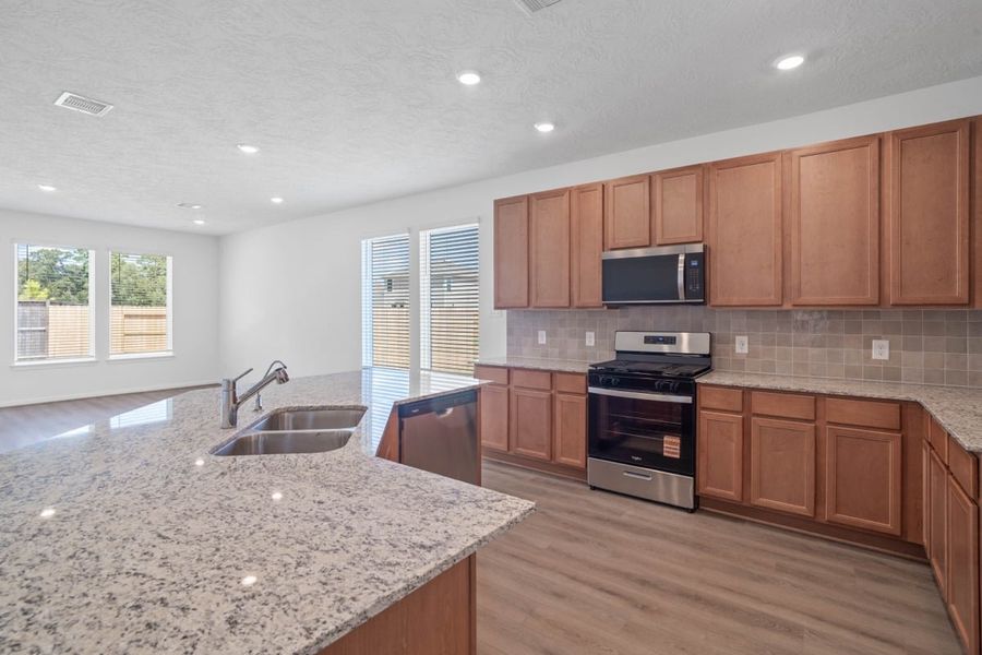 Furnished interior view inside a new home in Sagecrest Preserve, Conroe (Image 8).