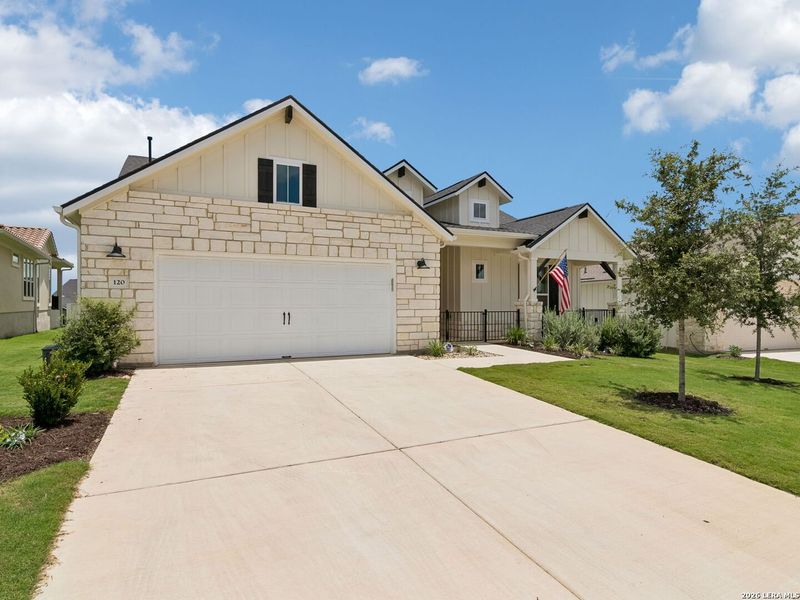 Front exterior of a new home in Kissing Tree, San Marcos, TX, highlighting curb appeal (Image 23). Front exterior of a new home in Kissing Tree, San Marcos, TX, highlighting curb appeal (Image 23).