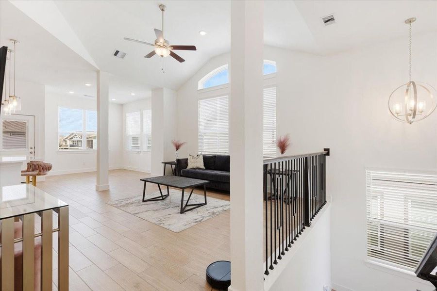 Furnished interior view inside a new home in Meridiana, Iowa Colony (Image 7).