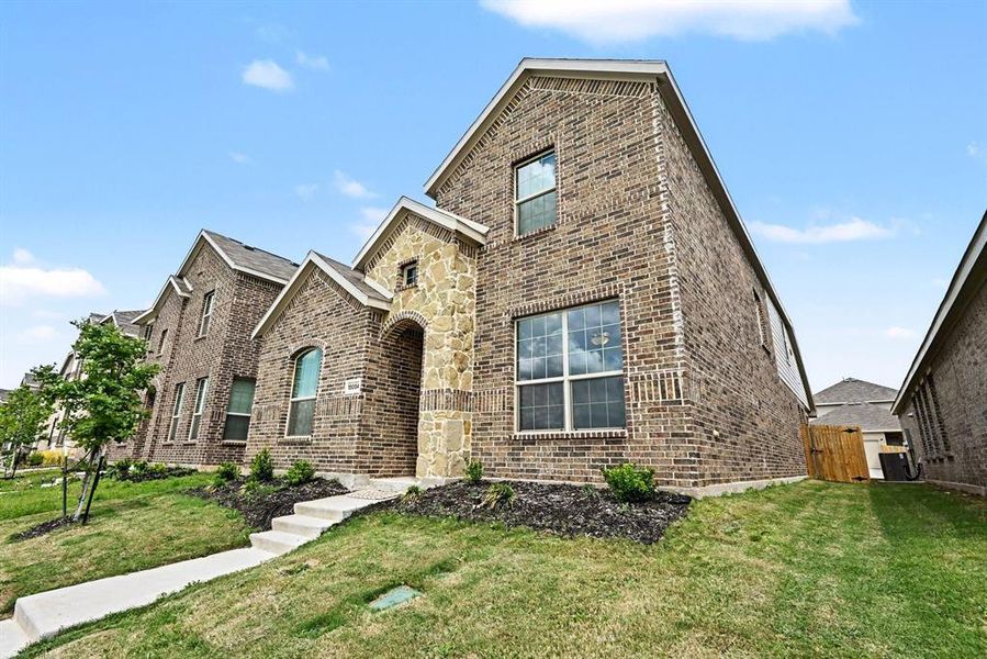 Front exterior of a new home in Northpointe, Fort Worth, TX, highlighting curb appeal (Image 16).