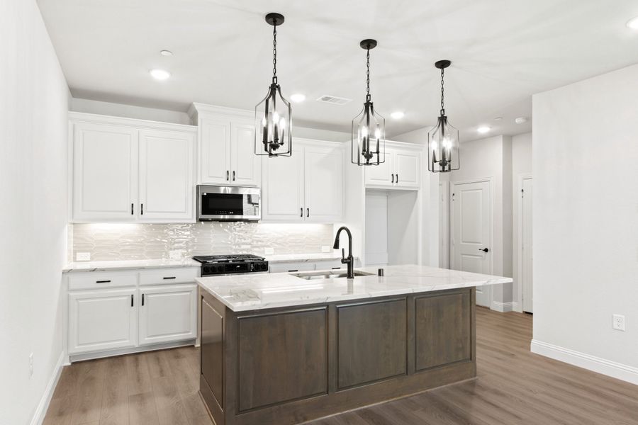 Furnished interior view inside a new home in The Tribute, The Colony (Image 10).