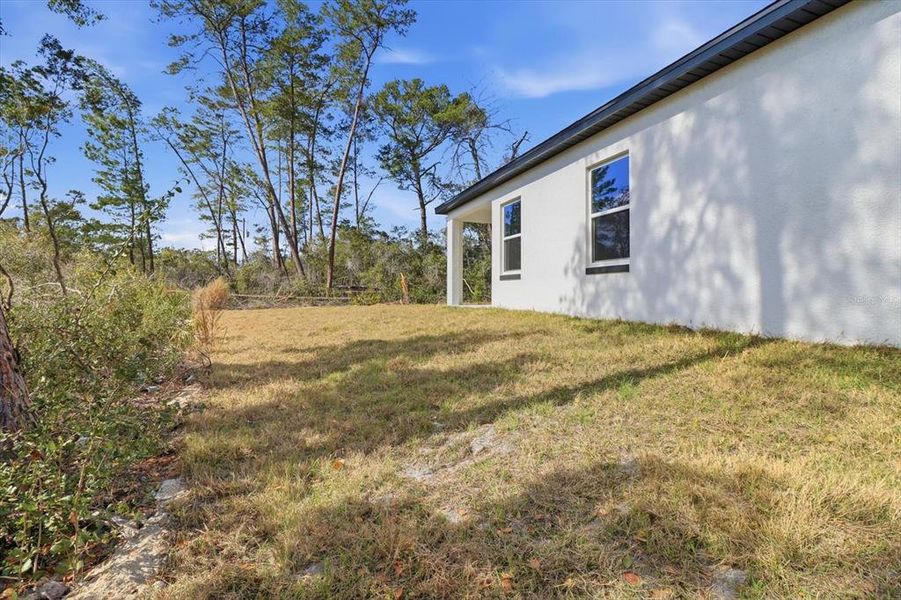 Exterior details and patio area of a home in , Ocala (Image 26).