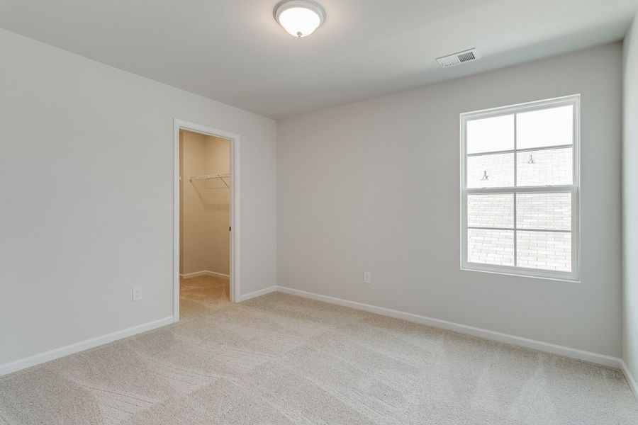 Spacious, unfurnished interior of a new home in Winston Point, Gilbert (Image 29).