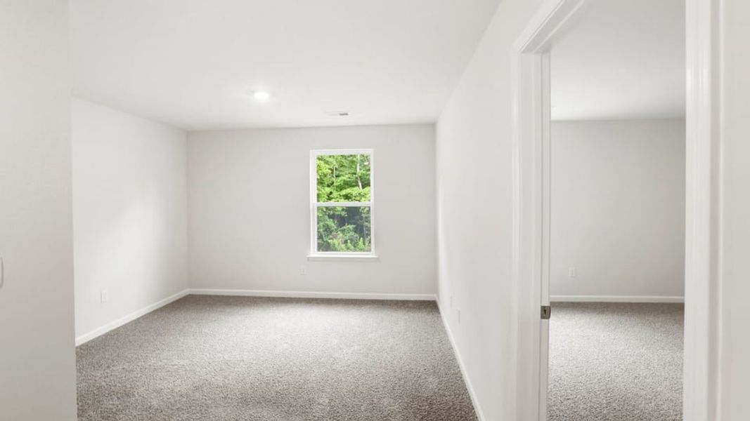 Spacious, unfurnished interior of a new home in Bentley Park, Greenwood (Image 25). Spacious, unfurnished interior of a new home in Bentley Park, Greenwood (Image 25).