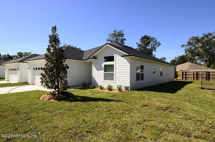 Exterior details and patio area of a home in , Jacksonville (Image 28). Exterior details and patio area of a home in , Jacksonville (Image 28).