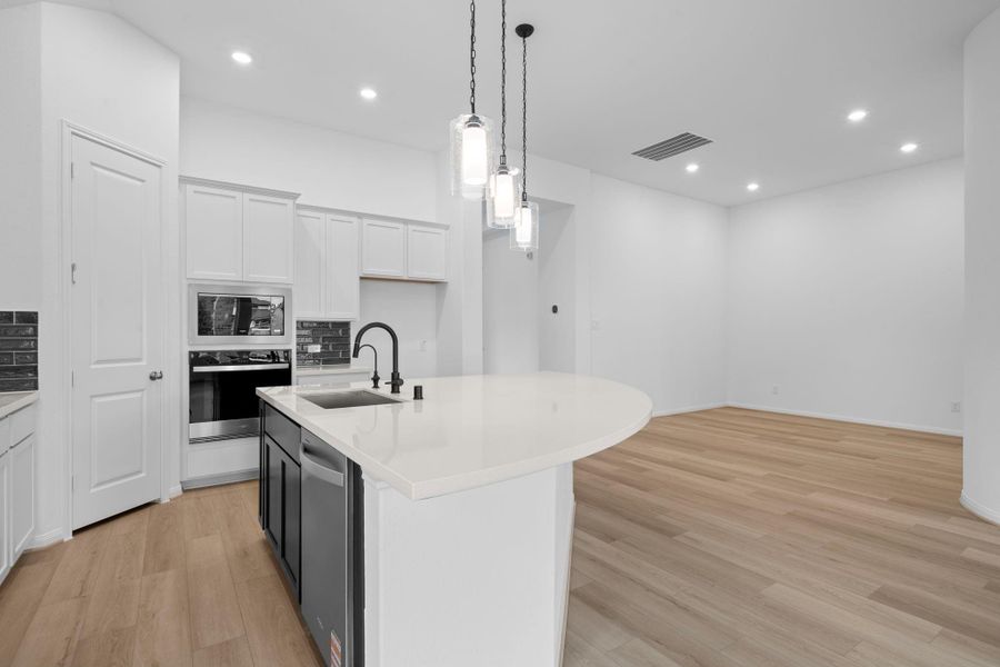 Furnished interior view inside a new home in Bridgeland, Cypress (Image 8).