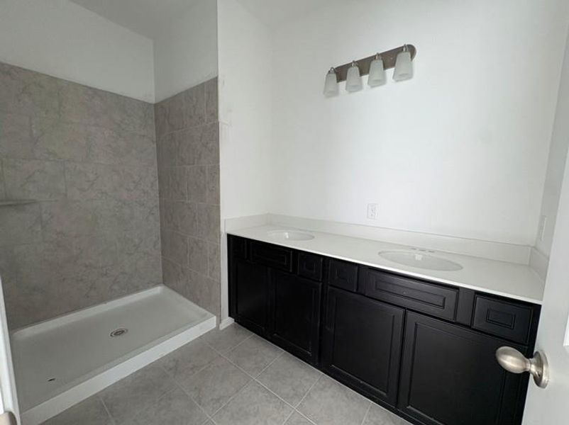 Primary Bath retreat with dual vanities & walk-in shower