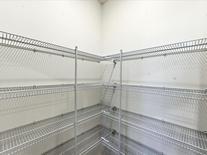 Spacious, unfurnished interior of a new home in The Coves at Lakes of Cane Bay II, Summerville (Image 33).