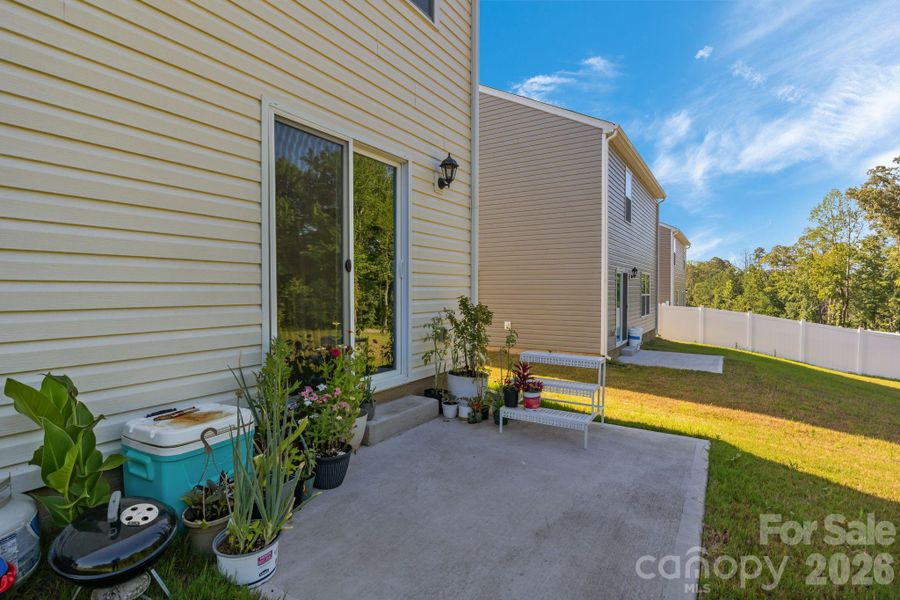 Exterior details and patio area of a home in Mills at Long Creek, Dallas (Image 4).