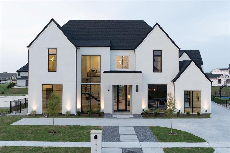 Front exterior of a new home in , Heath, TX, highlighting curb appeal (Image 13).