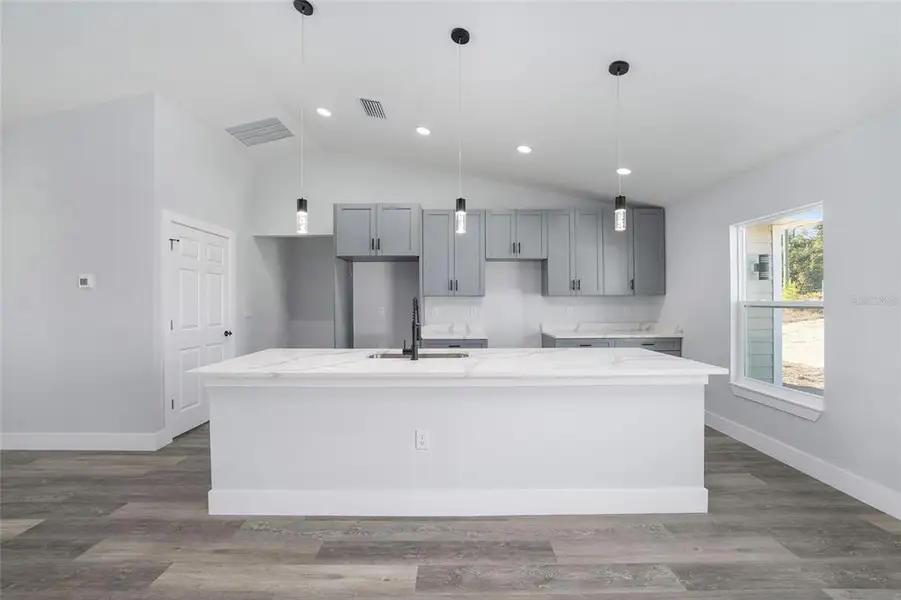 Furnished interior view inside a new home in , Dunnellon (Image 9).