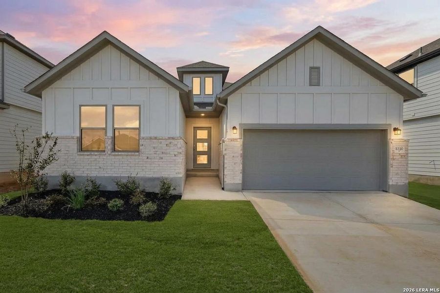 Front exterior of a new home in Garden Grove, San Antonio, TX, highlighting curb appeal (Image 26).