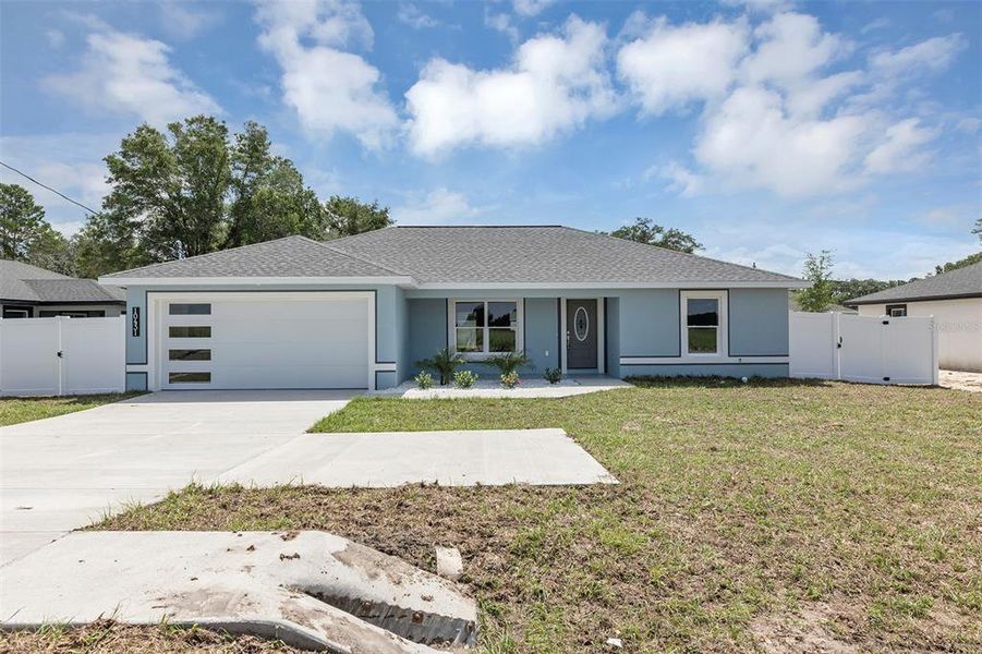 Front exterior of a new home in , Dunnellon, FL, highlighting curb appeal (Image 1). Front exterior of a new home in , Dunnellon, FL, highlighting curb appeal (Image 1).