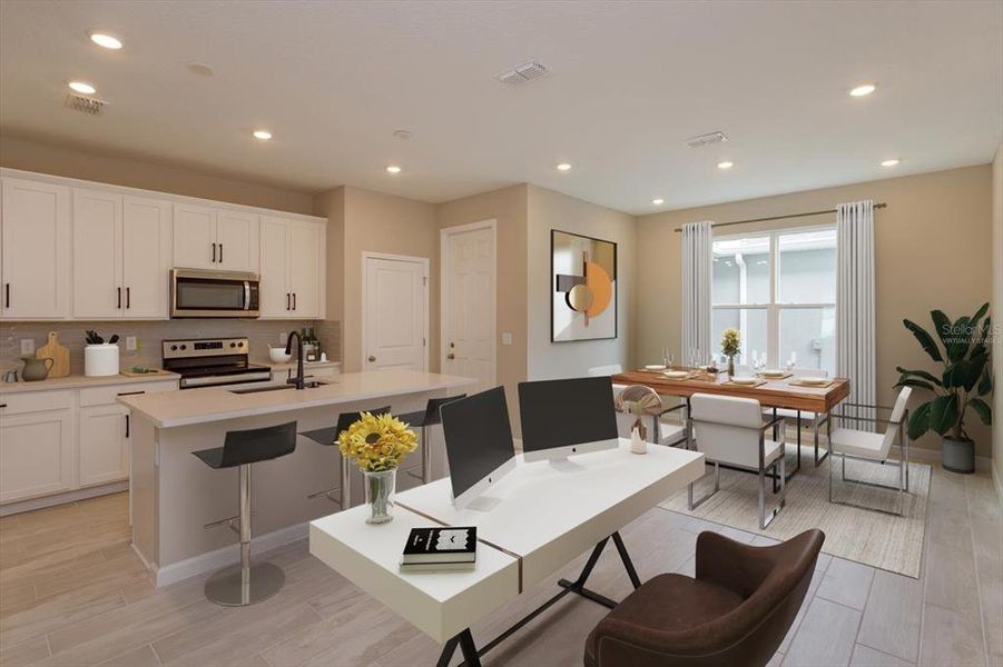 Furnished interior view inside a new home in Serenade at Ovation, Winter Garden (Image 14).