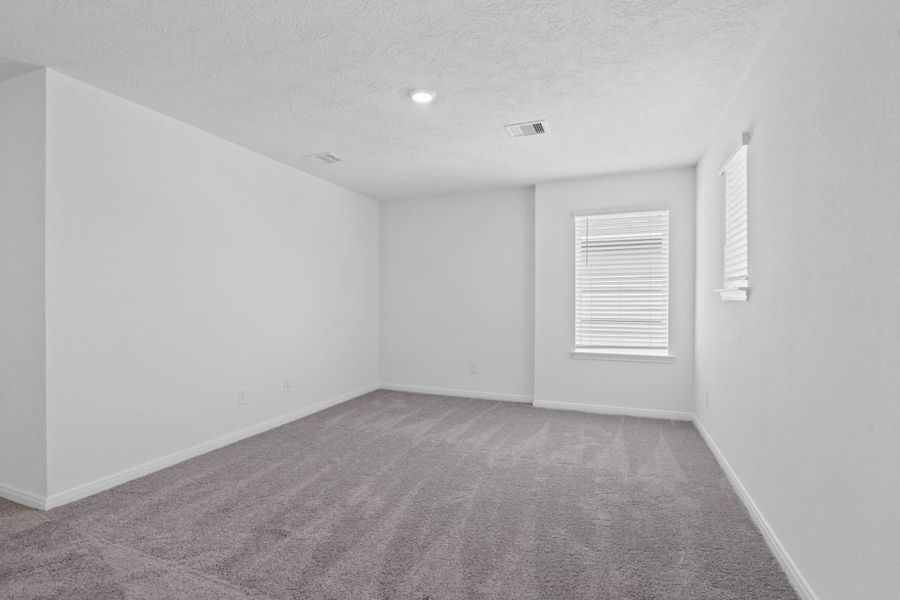 Spacious, unfurnished interior of a new home in Grace Landing, Willis (Image 16).