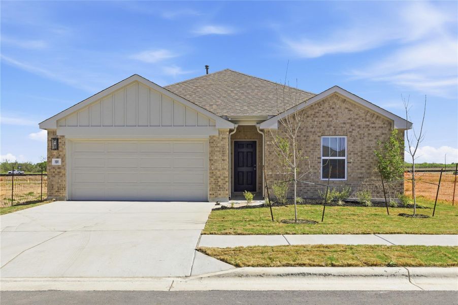 Front exterior of a new home in Infinity Square, Kyle, TX, highlighting curb appeal (Image 1). Front exterior of a new home in Infinity Square, Kyle, TX, highlighting curb appeal (Image 1).