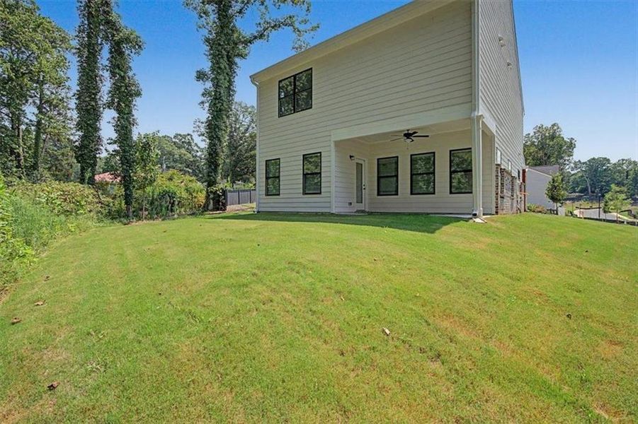 Exterior details and patio area of a home in Sawmill Creek, Austell (Image 4).