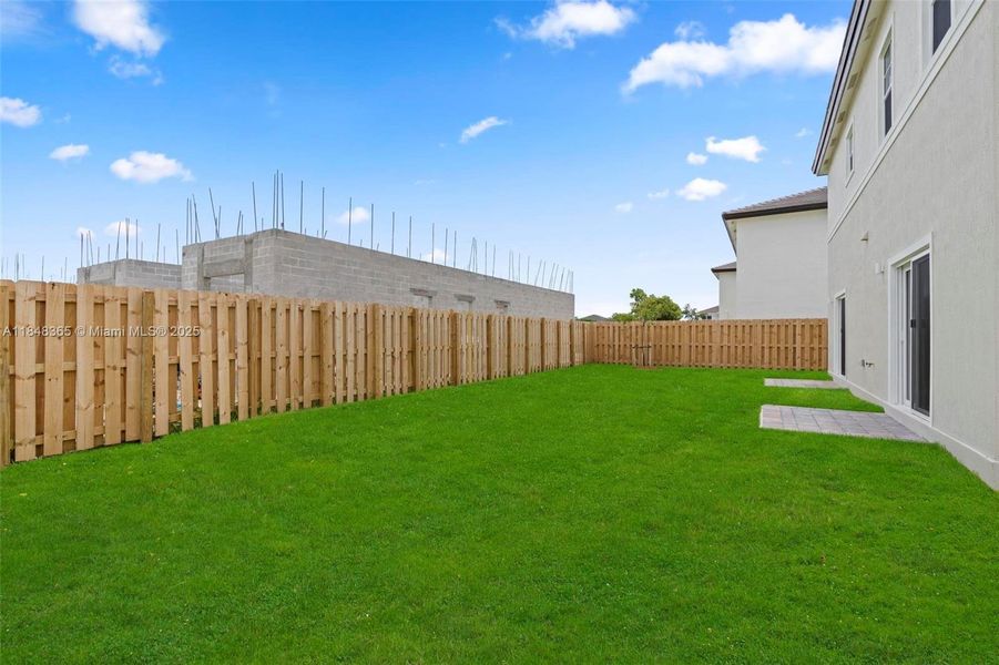 Front exterior of a new home in , Homestead, FL, highlighting curb appeal (Image 16).