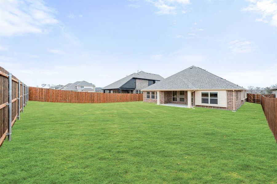 Exterior details and patio area of a home in Hampton Park, Glenn Heights (Image 28). Exterior details and patio area of a home in Hampton Park, Glenn Heights (Image 28).
