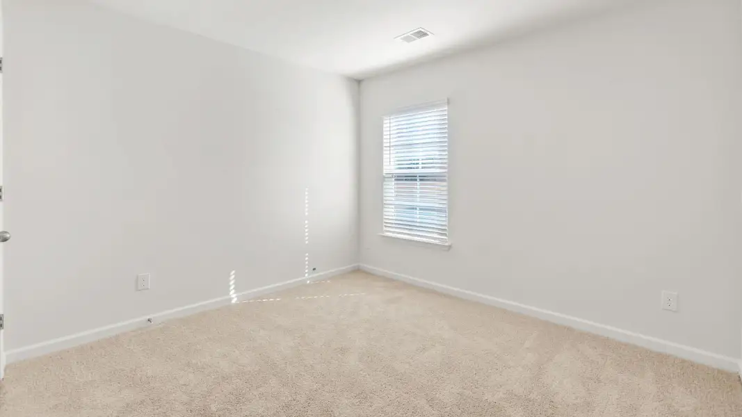Spacious, unfurnished interior of a new home in Neal Place, Stokesdale (Image 11). Spacious, unfurnished interior of a new home in Neal Place, Stokesdale (Image 11).