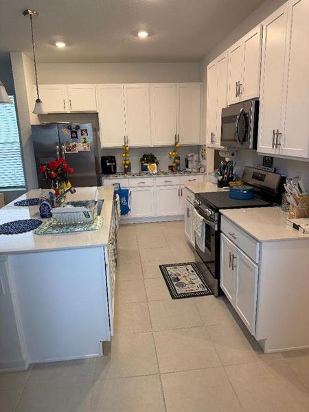 Furnished interior view inside a new home in Tohoqua, Kissimmee (Image 5).