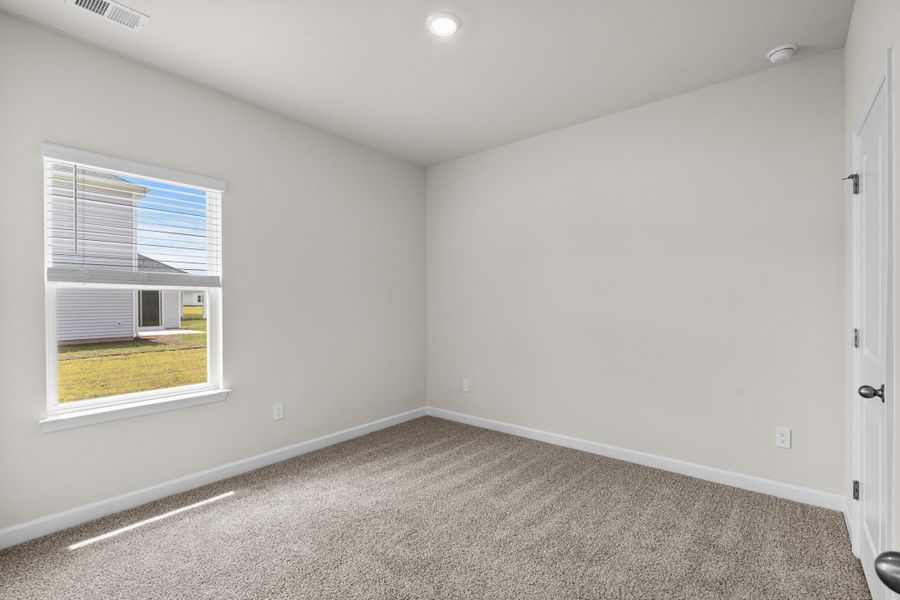 Spacious, unfurnished interior of a new home in Cypress Ridge - The Coastline Series, Longs (Image 26).