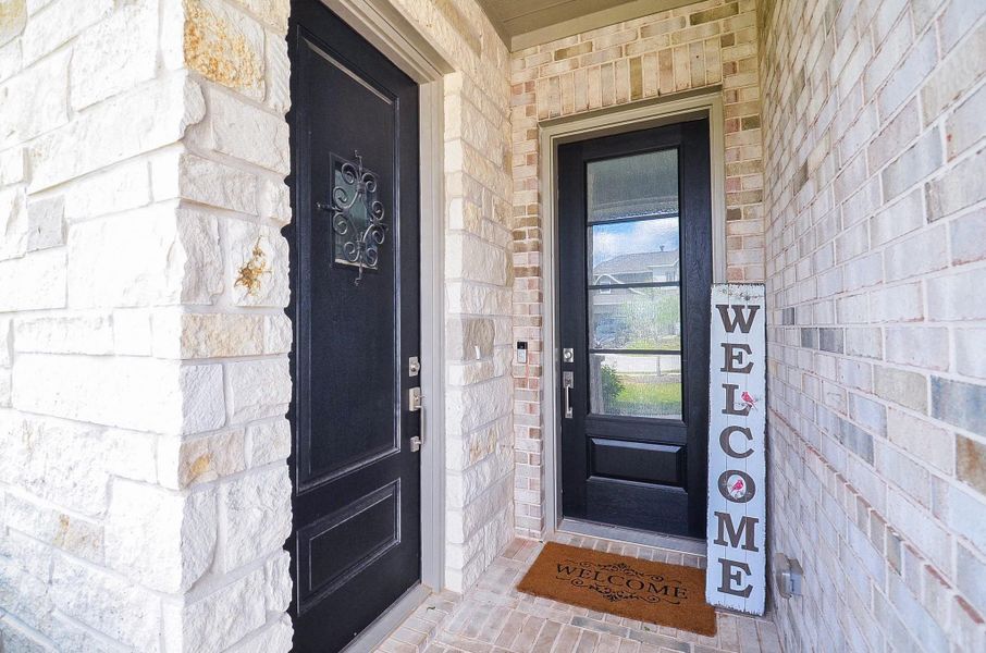 Exterior details and patio area of a home in Anniston, Katy (Image 26).