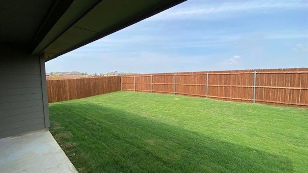 Exterior details and patio area of a home in Hickory Grove, Krum (Image 2). Exterior details and patio area of a home in Hickory Grove, Krum (Image 2).