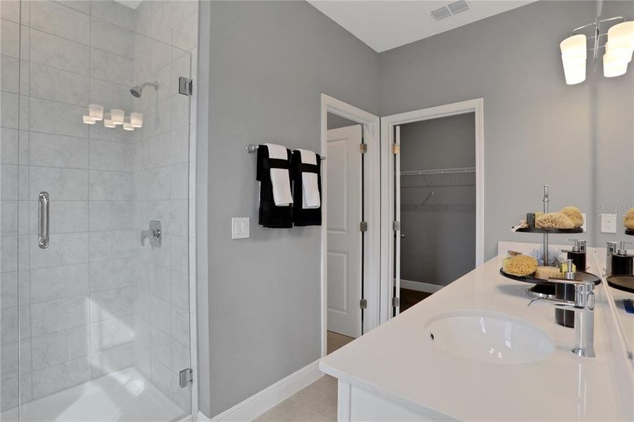 Furnished interior view inside a new home in Serenade at Ovation, Winter Garden (Image 26).