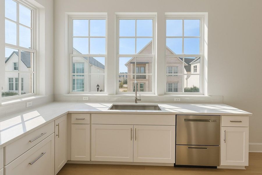 Corner Kitchen Window - East and South Facing, the Best of Light!  Huge Chef Sink, HansGrohen Plumbing Fixture and the Famous Double Cabin Fisher Paykel Dishwasher!